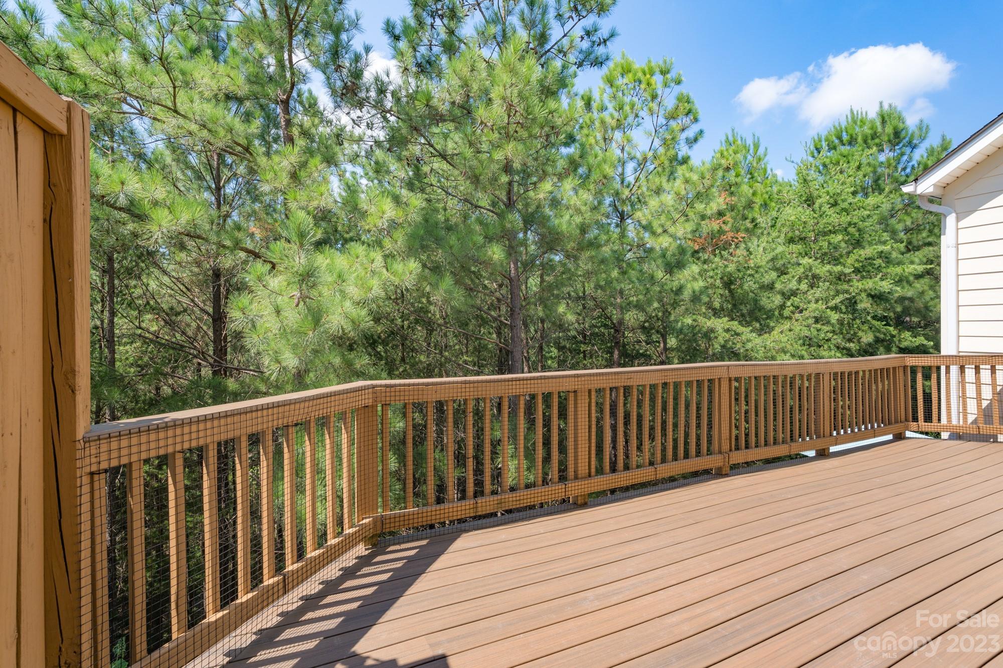 627 Sunfish Lane Tega Cay, SC 29708 - Photo 21 of 46 a balcony with wooden floor and fence