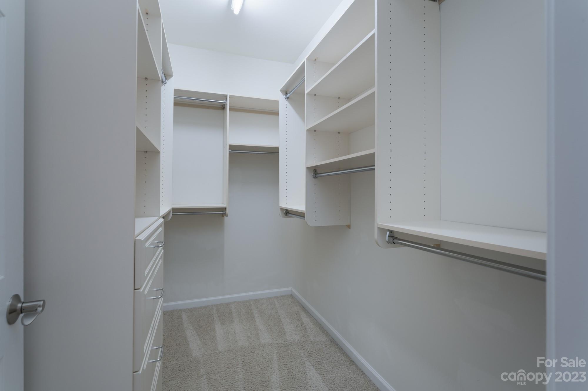 627 Sunfish Lane Tega Cay, SC 29708 - Photo 25 of 46 a view of walk in closet with empty racks