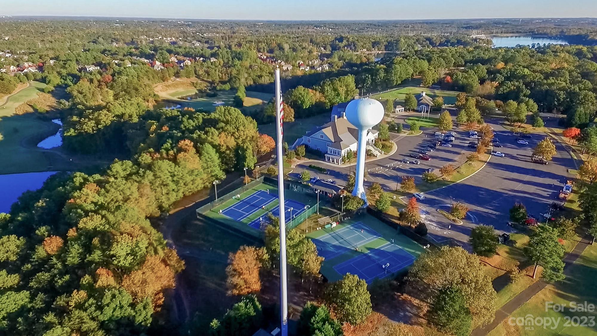 627 Sunfish Lane Tega Cay, SC 29708 - Photo 44 of 46 an aerial view of a house with a swimming pool yard and outdoor seating
