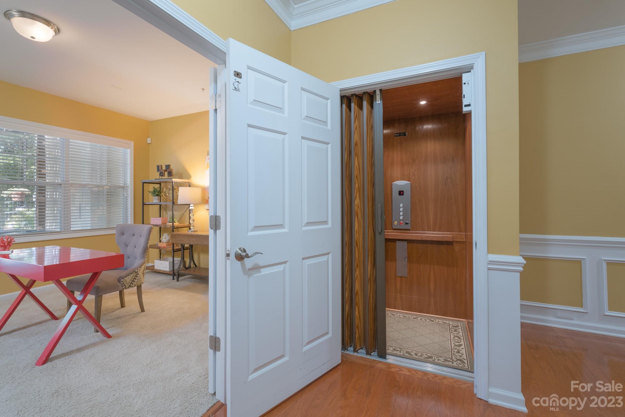 627 Sunfish Lane Tega Cay, SC 29708 - Photo 6 of 46 a view of a livingroom with furniture and an entryway door
