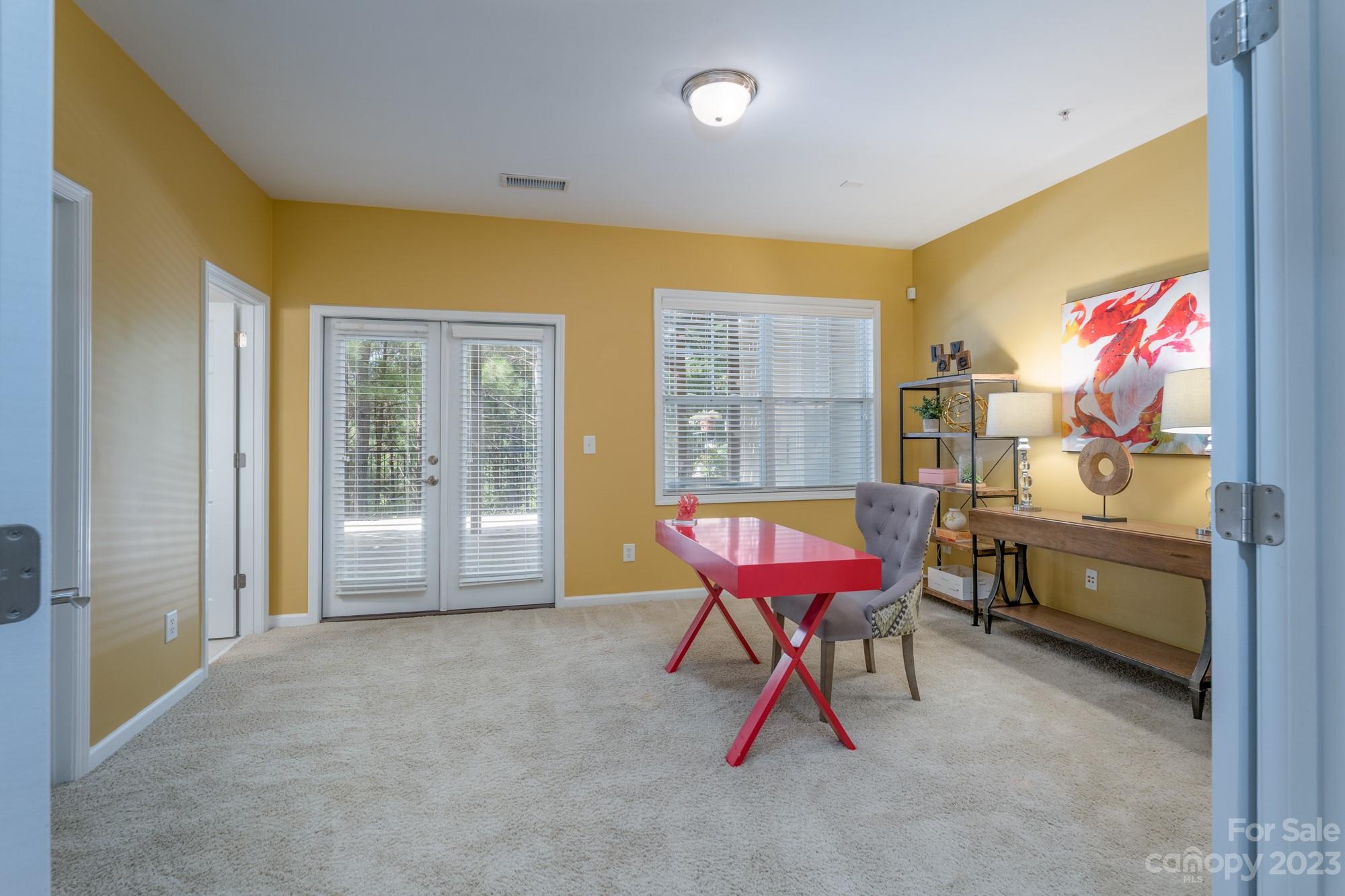 627 Sunfish Lane Tega Cay, SC 29708 - Photo 7 of 46 a living room with furniture and floor to ceiling window