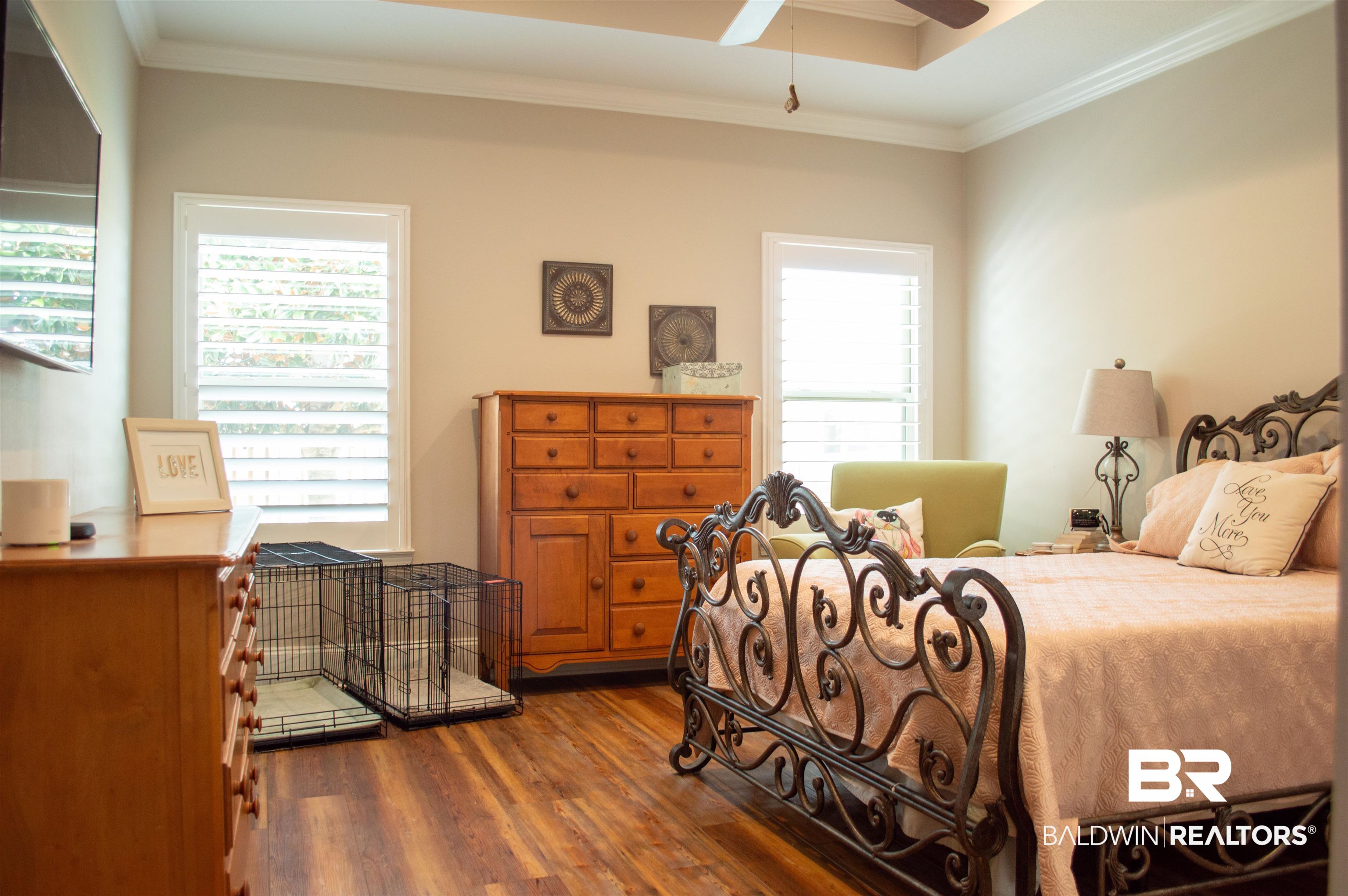 1124 West Orlando Drive Foley, AL 36535 - Photo 17 of 51 Bedroom featuring crown molding, dark wood-type flooring, and ceiling fan