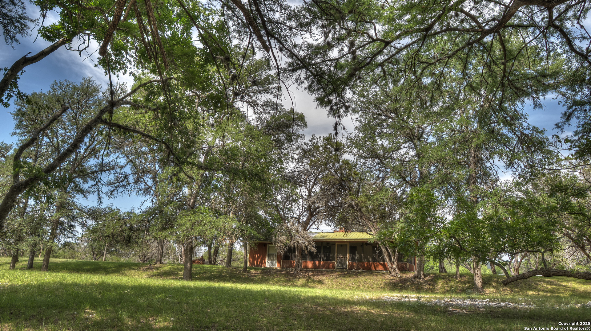 154 Weston Road Leakey, TX 78873 - Photo 18 of 39 a front view of a house with a garden