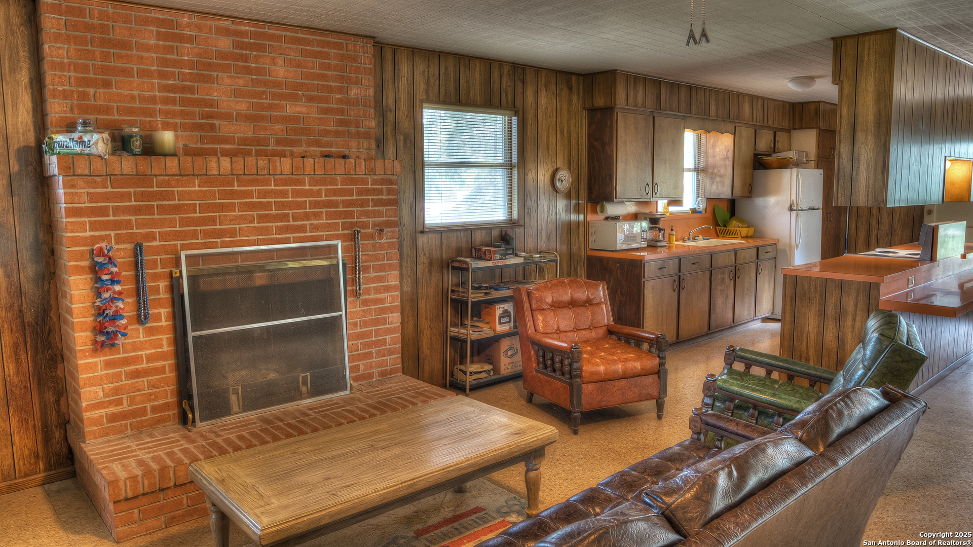 154 Weston Road Leakey, TX 78873 - Photo 23 of 39 a living room with furniture and a fireplace