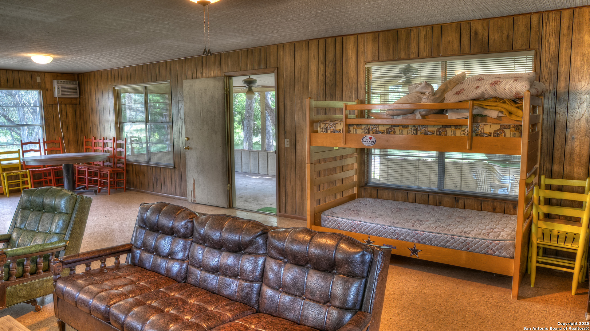 154 Weston Road Leakey, TX 78873 - Photo 24 of 39 a living room with furniture and a window