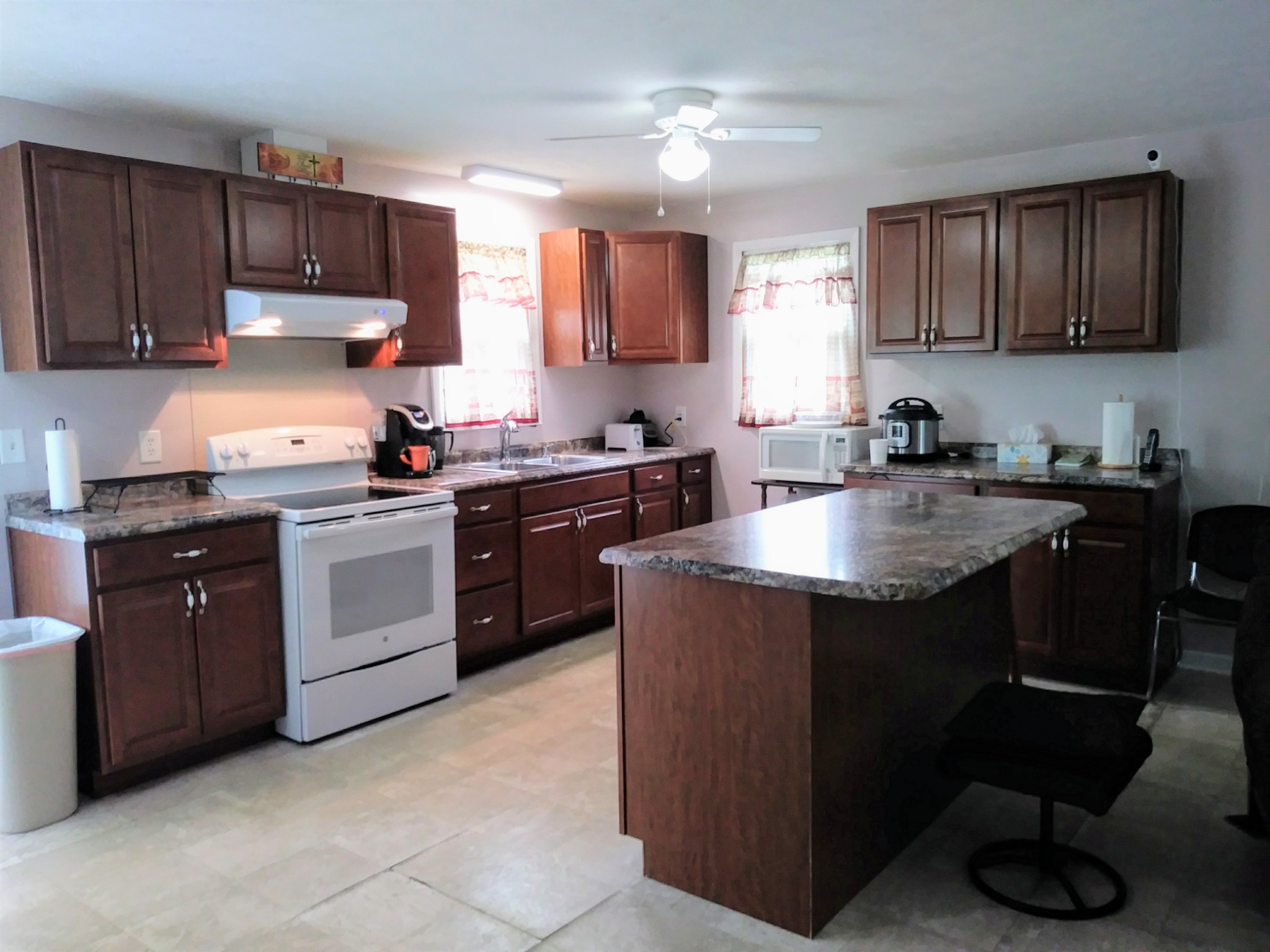 258 Union Ridge Road Wartrace, TN 37183 - Photo 6 of 25 a kitchen with a sink a stove and cabinets