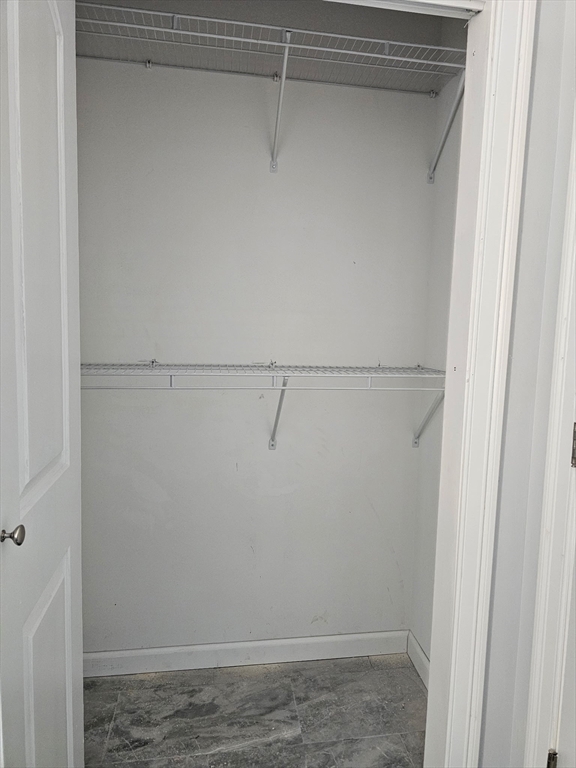 88 Stafford Holland Road Wales, MA 01081 - Photo 19 of 31 a view of a room with racks on the wall