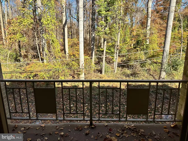 a view of balcony with furniture
