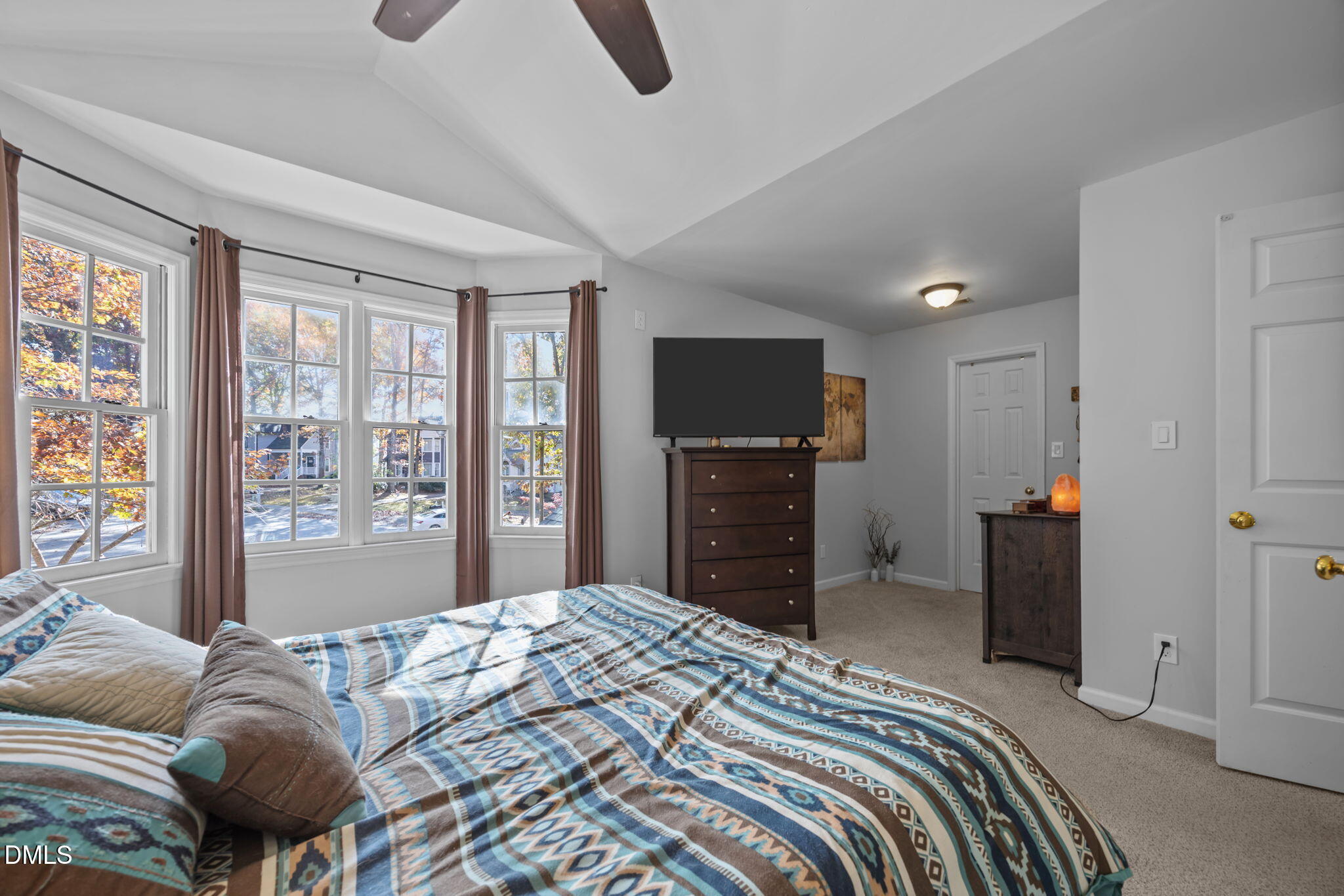 4952 Liverpool Lane Raleigh, NC 27604 - Photo 22 of 44 a bedroom with a bed and a television