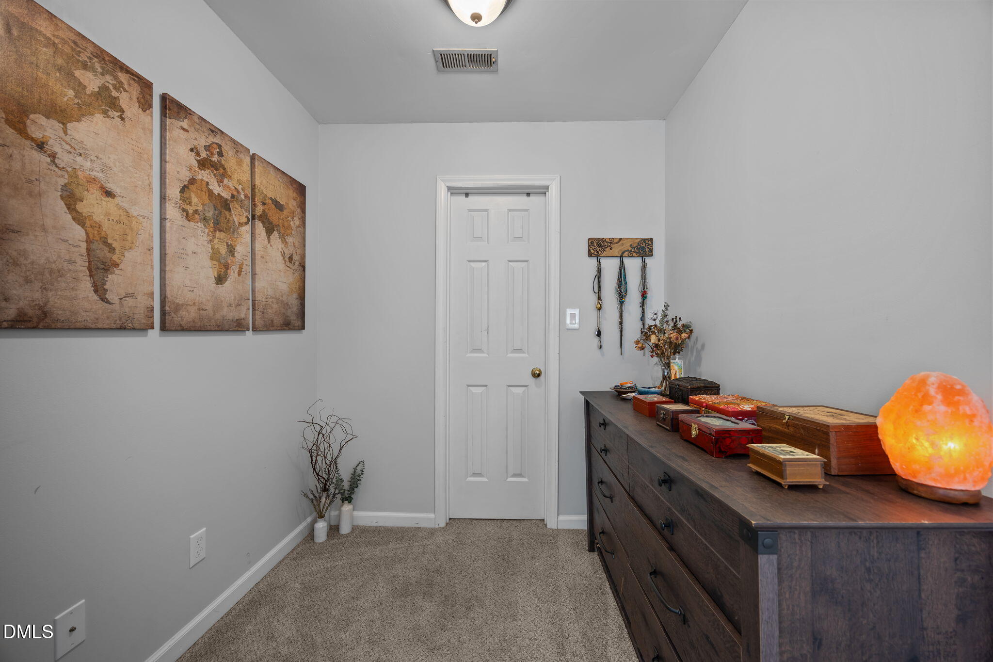 4952 Liverpool Lane Raleigh, NC 27604 - Photo 23 of 44 a bedroom with a bed and wooden floor