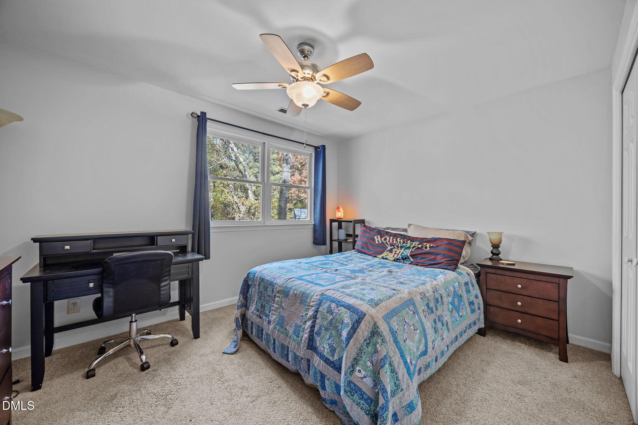 4952 Liverpool Lane Raleigh, NC 27604 - Photo 27 of 44 a bedroom with a bed and a window