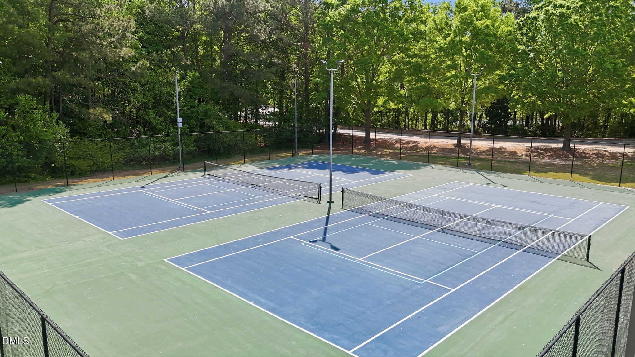 4952 Liverpool Lane Raleigh, NC 27604 - Photo 40 of 44 a view of a tennis court