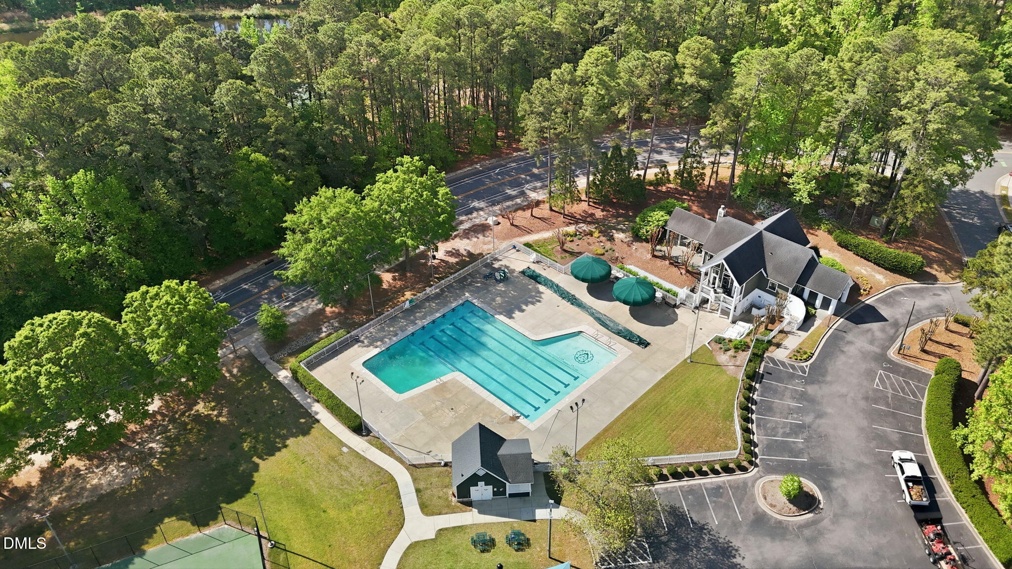 4952 Liverpool Lane Raleigh, NC 27604 - Photo 43 of 44 an aerial view of a house with a yard and trees