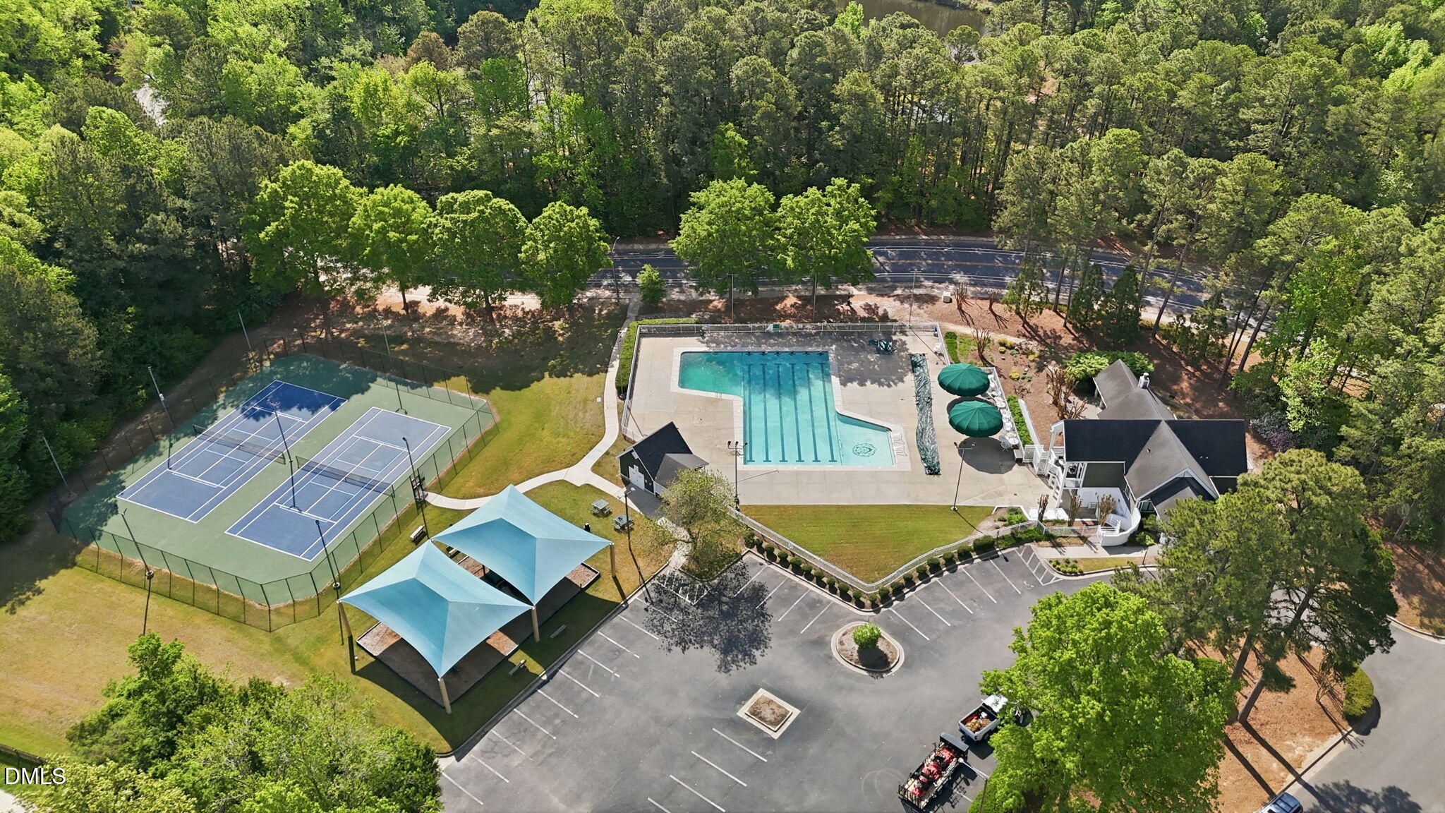 4952 Liverpool Lane Raleigh, NC 27604 - Photo 44 of 44 an aerial view of a house with a swimming pool and outdoor space