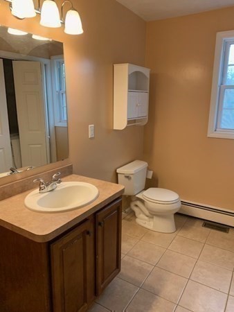 155 Barre Paxton Road Rutland, MA 01543 - Photo 21 of 42 a bathroom with a sink and a toilet