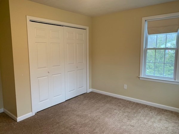 155 Barre Paxton Road Rutland, MA 01543 - Photo 36 of 42 an empty room with windows and closet