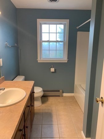 155 Barre Paxton Road Rutland, MA 01543 - Photo 38 of 42 a bathroom with a sink and toilet