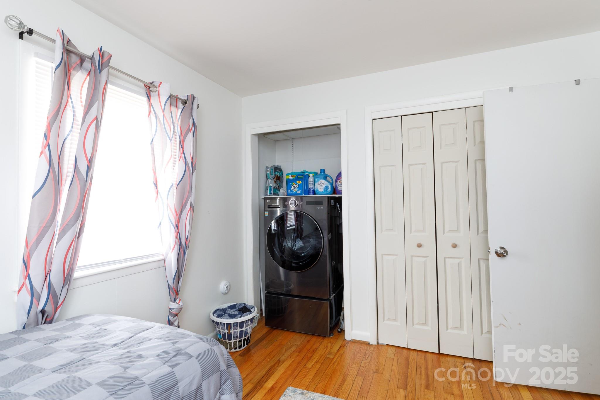 103 Perry Street Shelby, NC 28150 - Photo 14 of 22 a bedroom with a bed and a window