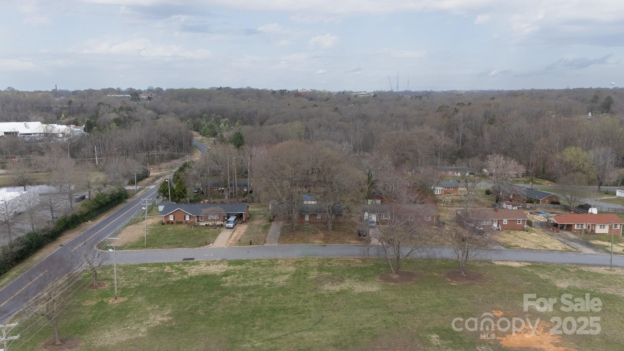 103 Perry Street Shelby, NC 28150 - Photo 22 of 22 a view of a lake in middle of the town