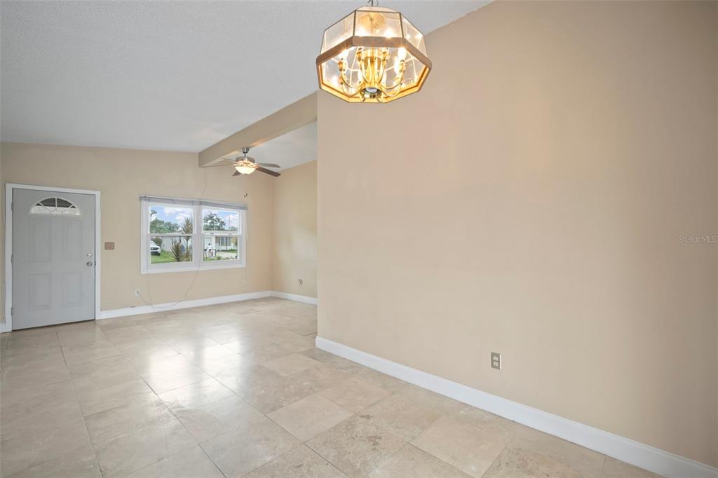 4712 Bessie Road Tampa, FL 33615 - Photo 11 of 28 an empty room with a window