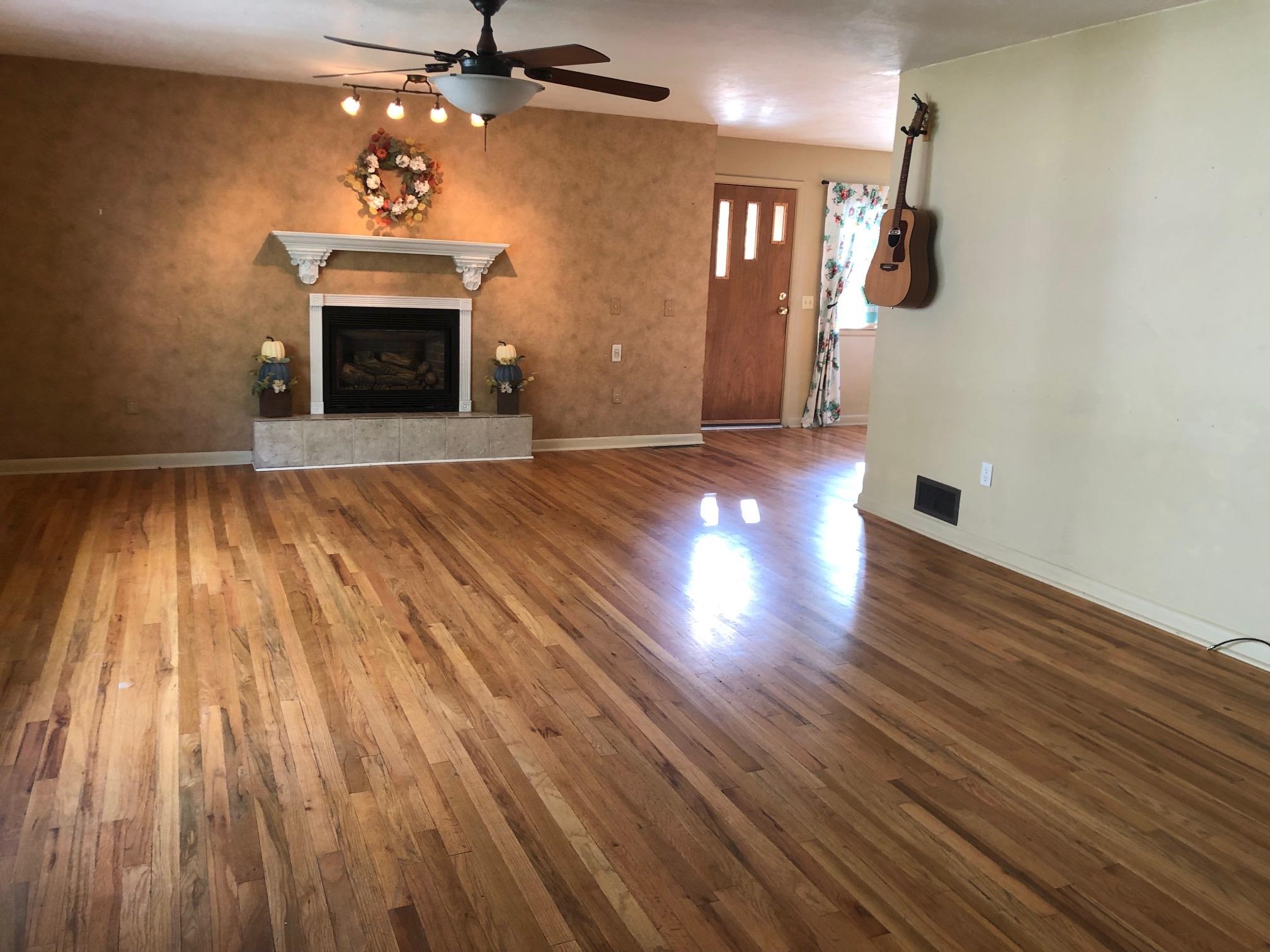 445 Hall Avenue Grand Junction, CO 81501 - Photo 12 of 23 wooden floor fireplace and natural light in room