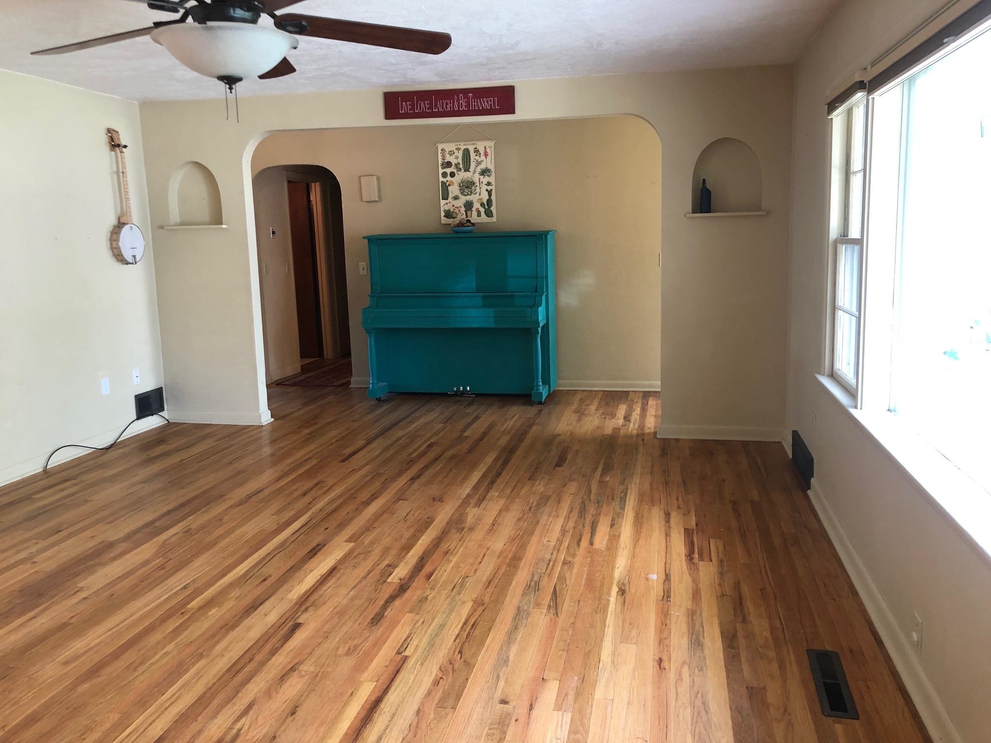 445 Hall Avenue Grand Junction, CO 81501 - Photo 13 of 23 a view of a room with wooden floor