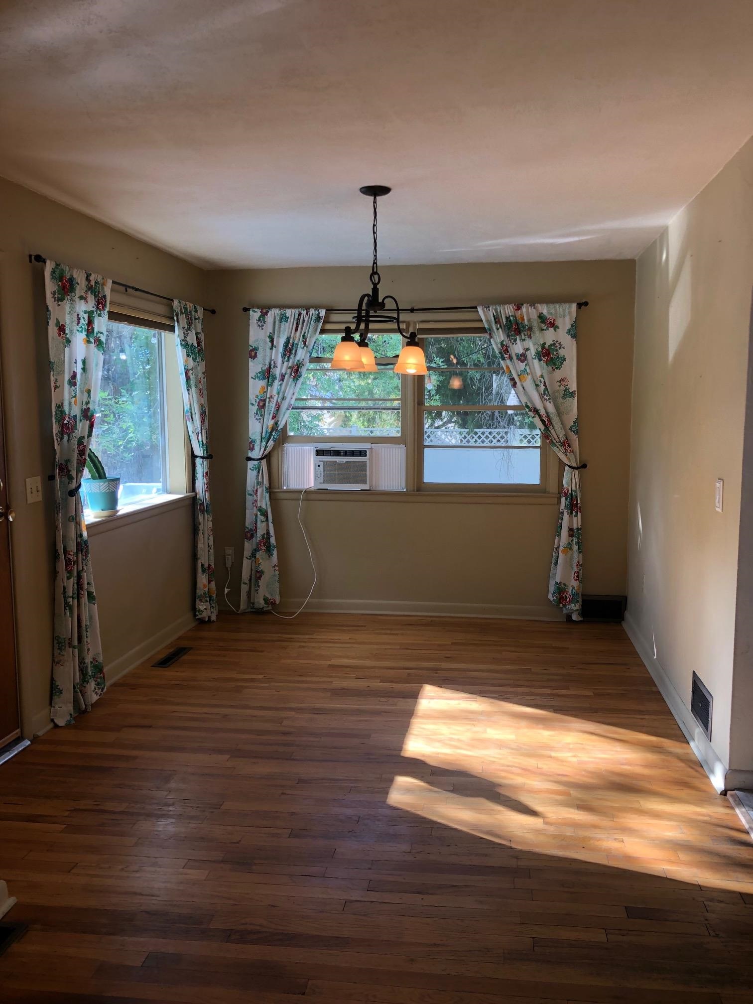 445 Hall Avenue Grand Junction, CO 81501 - Photo 10 of 23 a view of empty room with wooden floor and fan