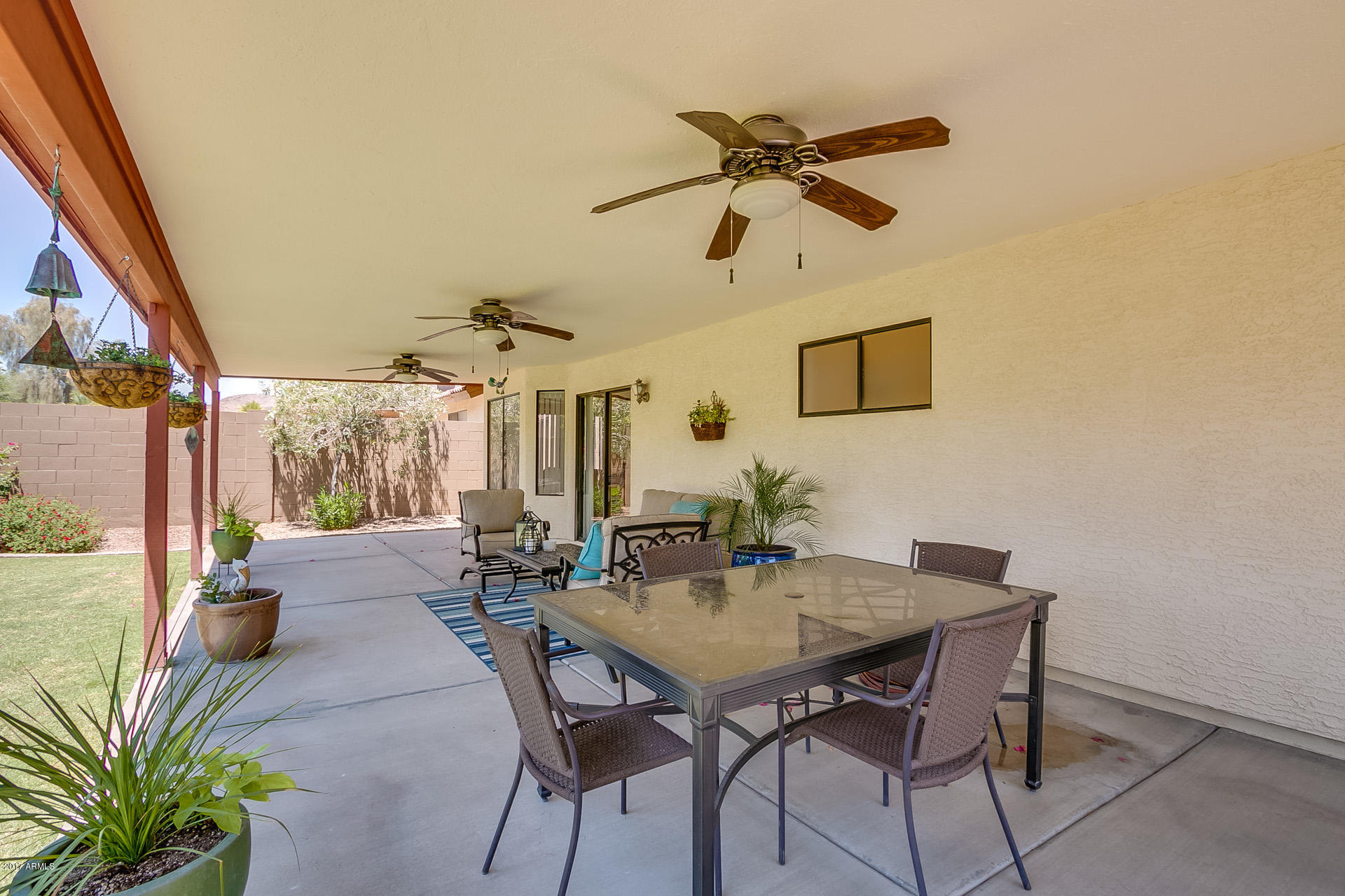 3623 East Agave Road Phoenix, AZ 85044 - Photo 30 of 41 a view of a dining room with furniture window and outside view