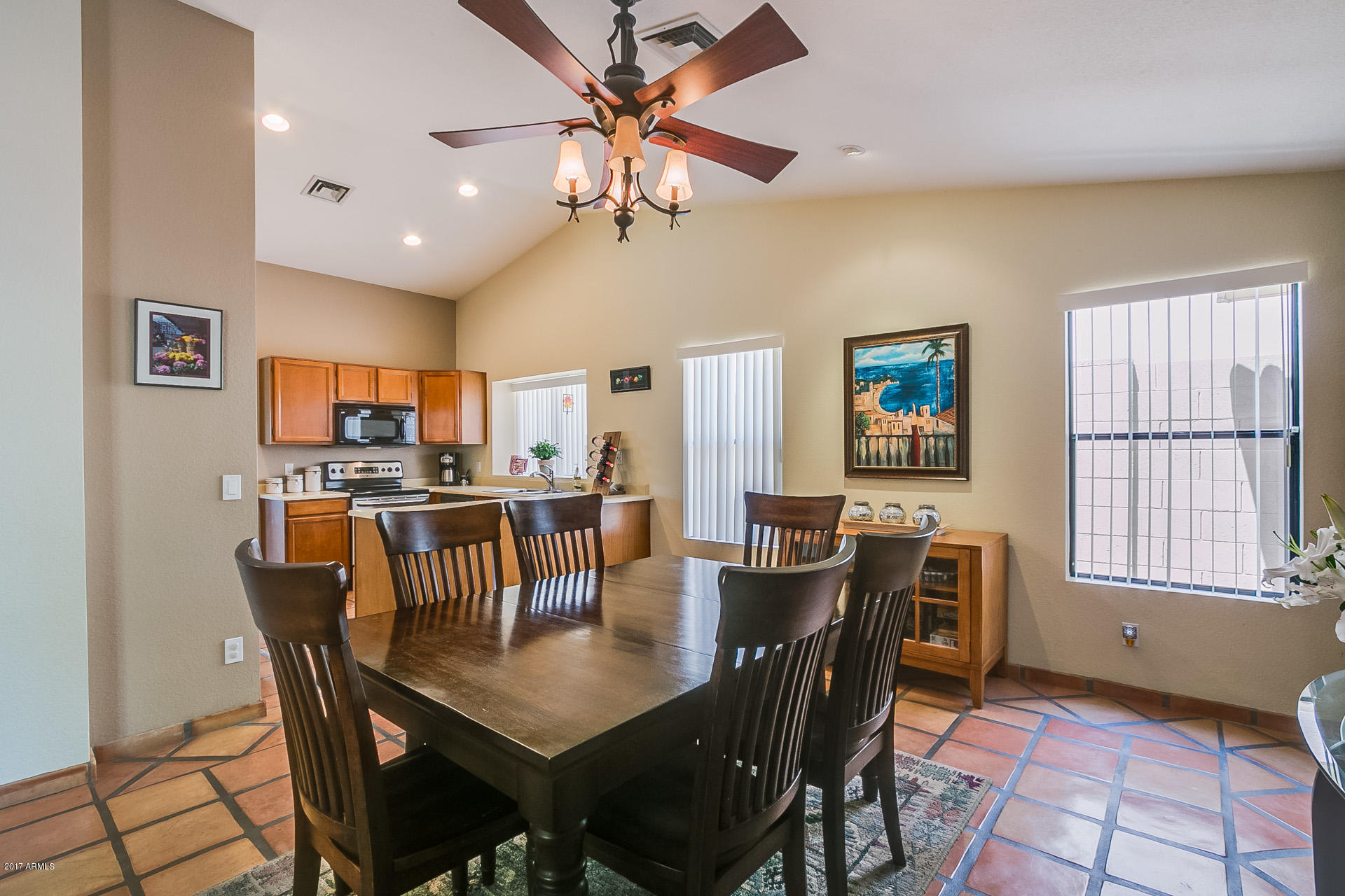 3623 East Agave Road Phoenix, AZ 85044 - Photo 10 of 41 a view of a dining room with furniture