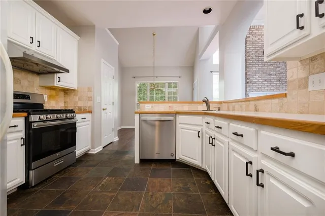 a bathroom with a sink and toilet