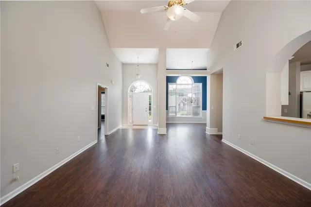 a bathroom with a sink a mirror and a shower