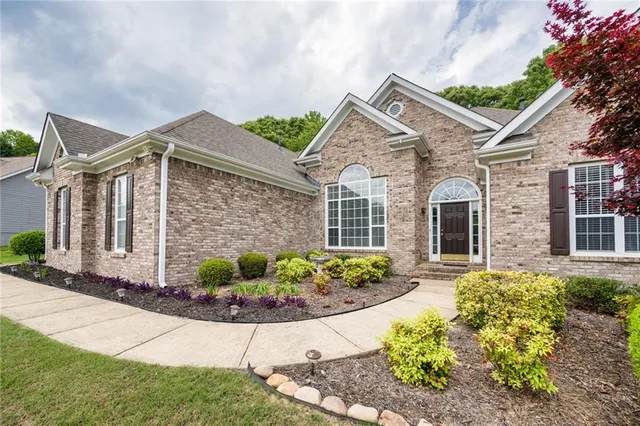 front view of a house with a yard