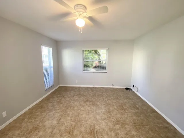 a view of an empty room with a window
