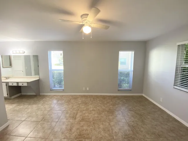 a bathroom with a shower and toilet