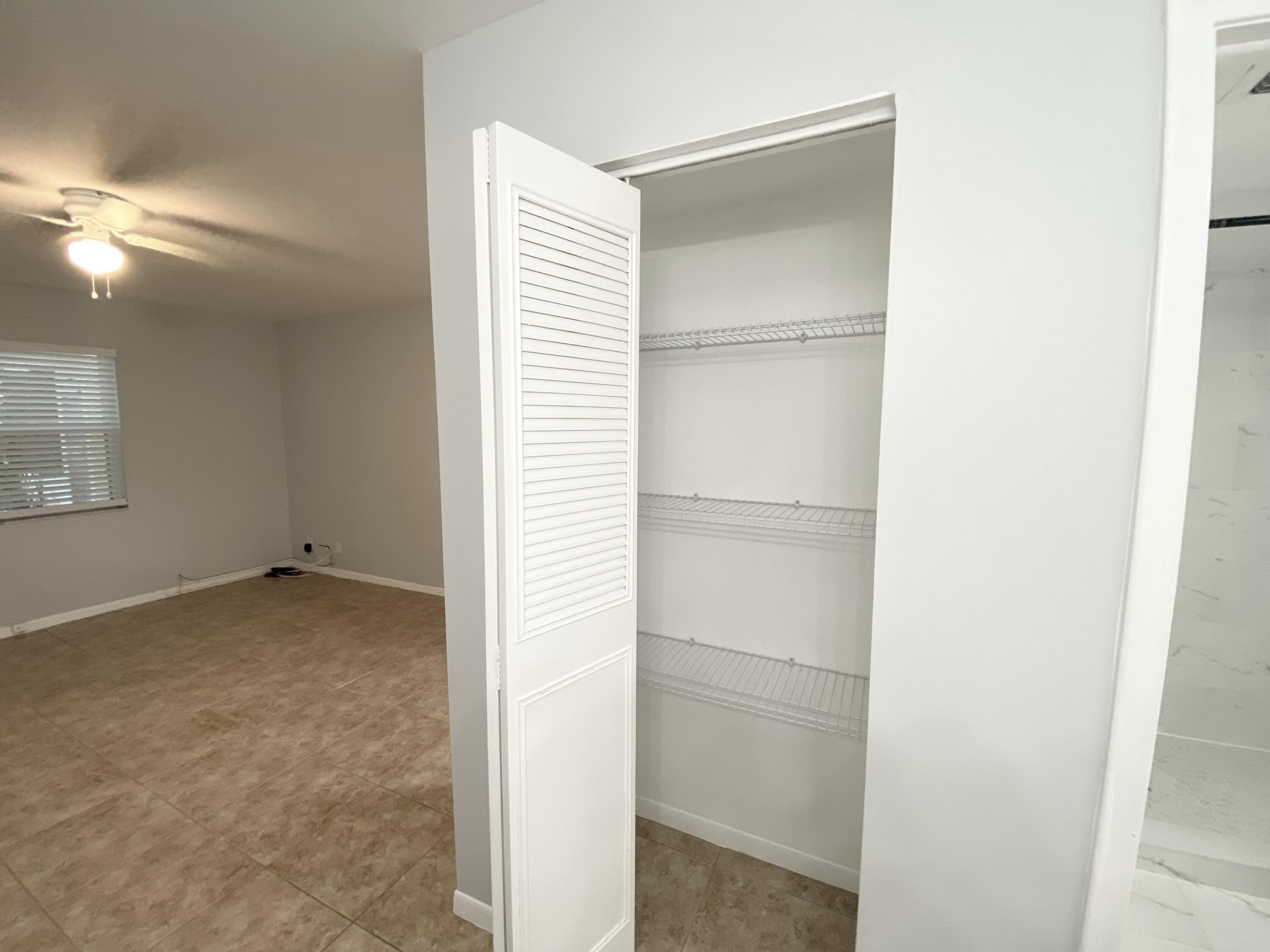 1100 Boxwood Drive, Unit 101 Delray Beach, FL 33445 - Photo 20 of 33 a view of an empty room
