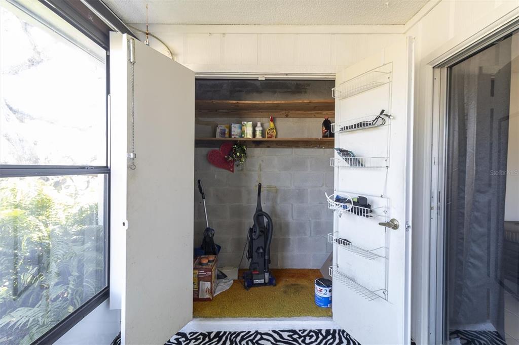 11410 Carriage Hill Drive, Unit 1 Port Richey, FL 34668 - Photo 21 of 63 a view of water heater room