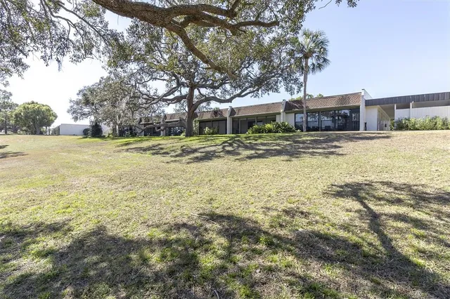 a view of a swimming pool with a lounge chair