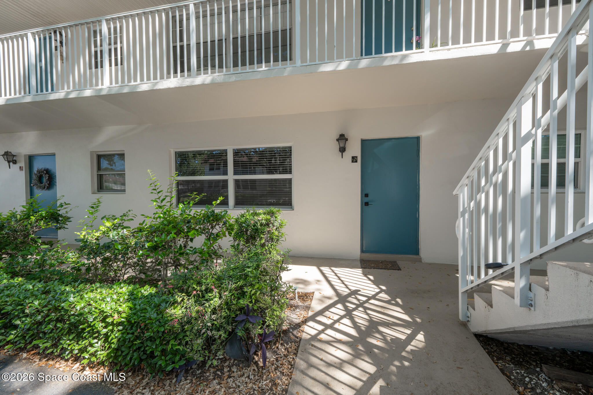 150 Intrepid Way, Unit 8D Cape Canaveral, FL 32920 - Photo 2 of 36 a house view with a backyard
