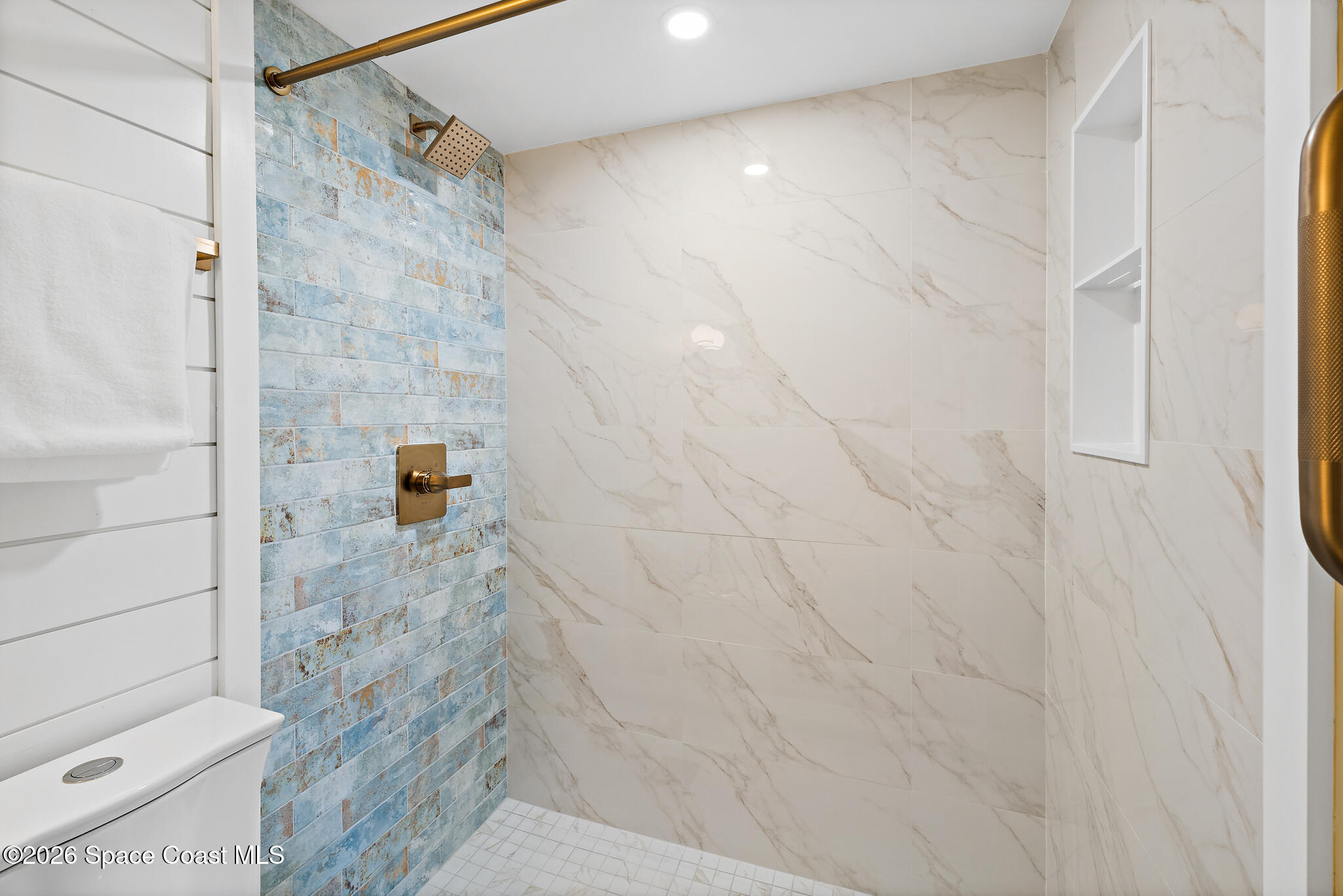 150 Intrepid Way, Unit 8D Cape Canaveral, FL 32920 - Photo 21 of 36 a bathroom with a shower