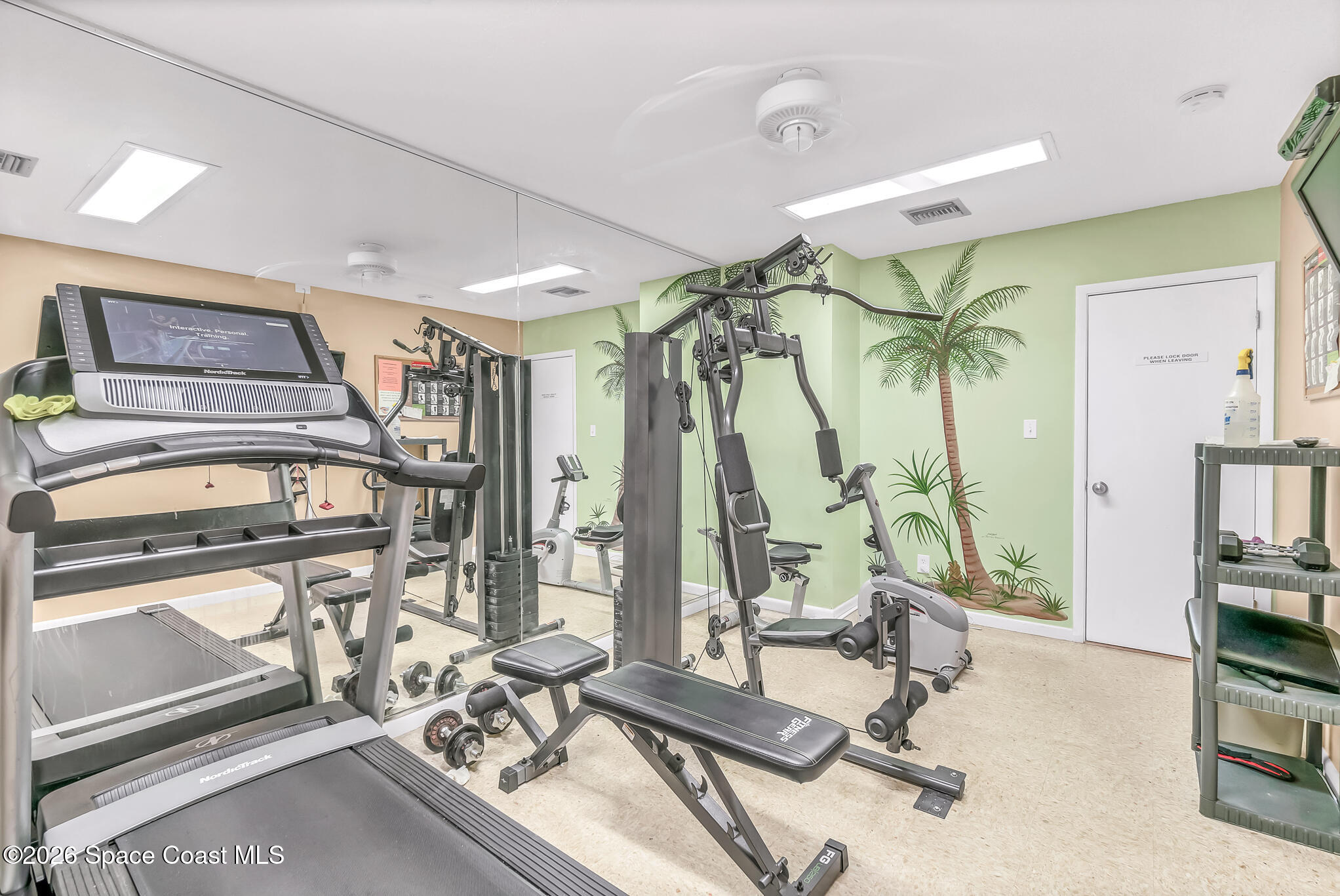 150 Intrepid Way, Unit 8D Cape Canaveral, FL 32920 - Photo 35 of 36 a view of a room with gym equipment