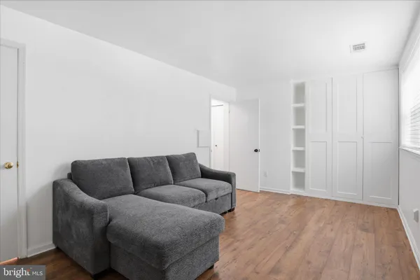 a room with furniture and a window