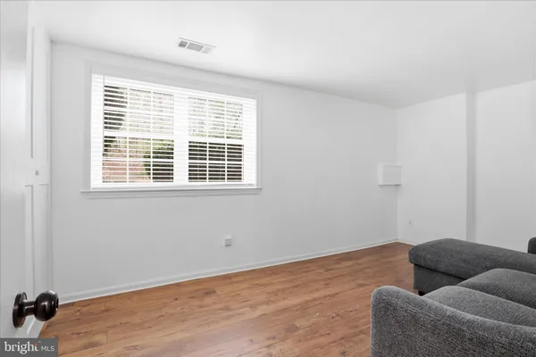 a bathroom with a shower a toilet and a shower