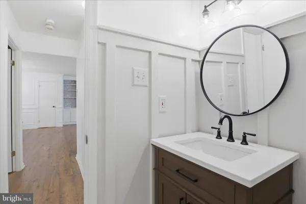 a view of a backyard with wooden fence