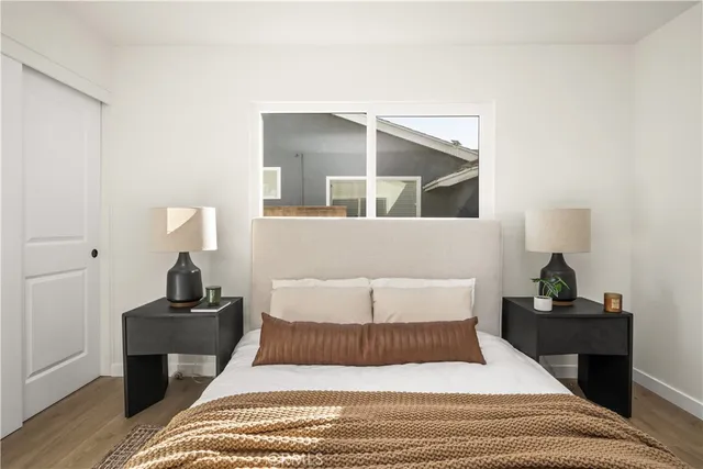 a bathroom with a sink vanity mirror and toilet