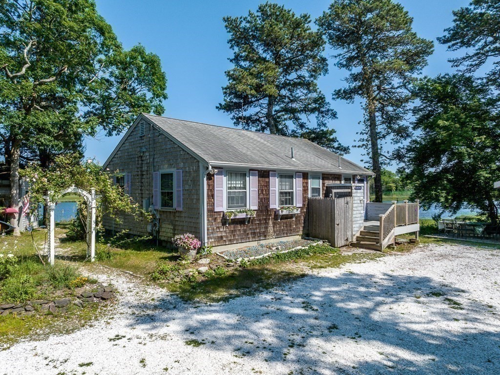 41 Aunt Debby's Road Dennis Port, MA 02639 - Photo 17 of 42 a front view of a house with garden