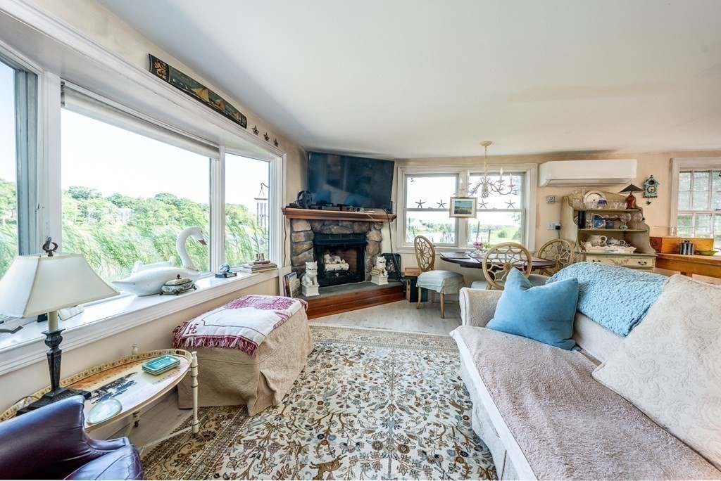 41 Aunt Debby's Road Dennis Port, MA 02639 - Photo 21 of 42 a bed room with a bed and a fireplace