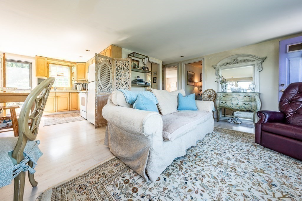 41 Aunt Debby's Road Dennis Port, MA 02639 - Photo 23 of 42 a living room with furniture and a large window