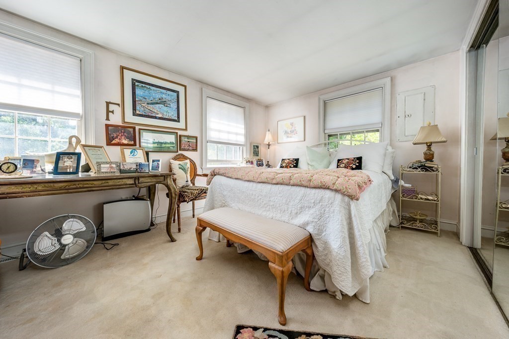 41 Aunt Debby's Road Dennis Port, MA 02639 - Photo 30 of 42 a bedroom with a bed and a couch