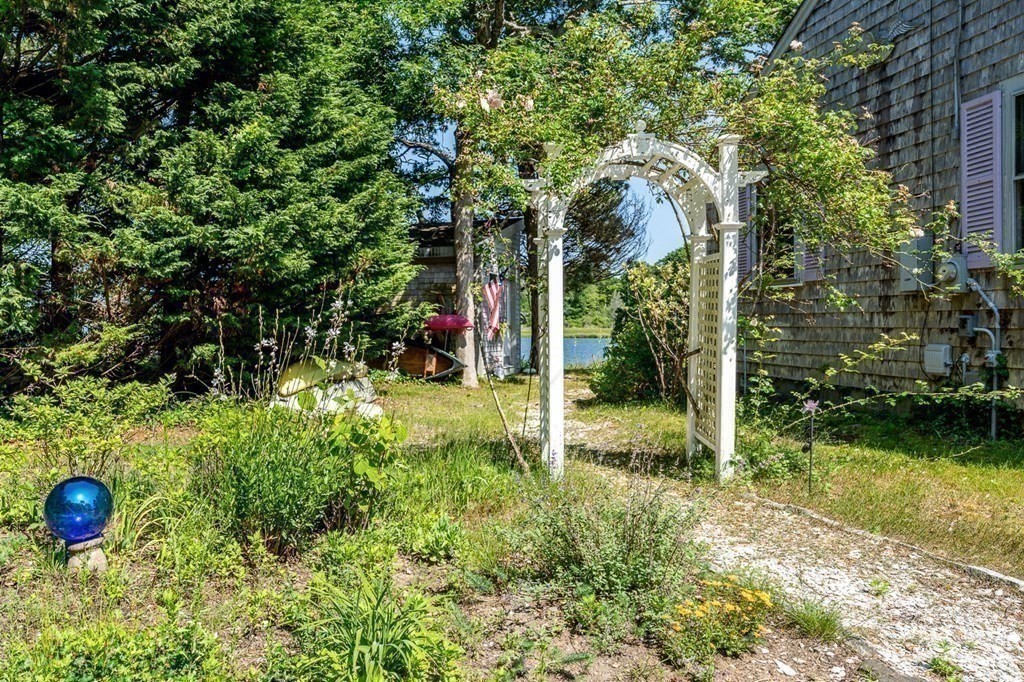 41 Aunt Debby's Road Dennis Port, MA 02639 - Photo 34 of 42 a view of a outdoor space and a yard