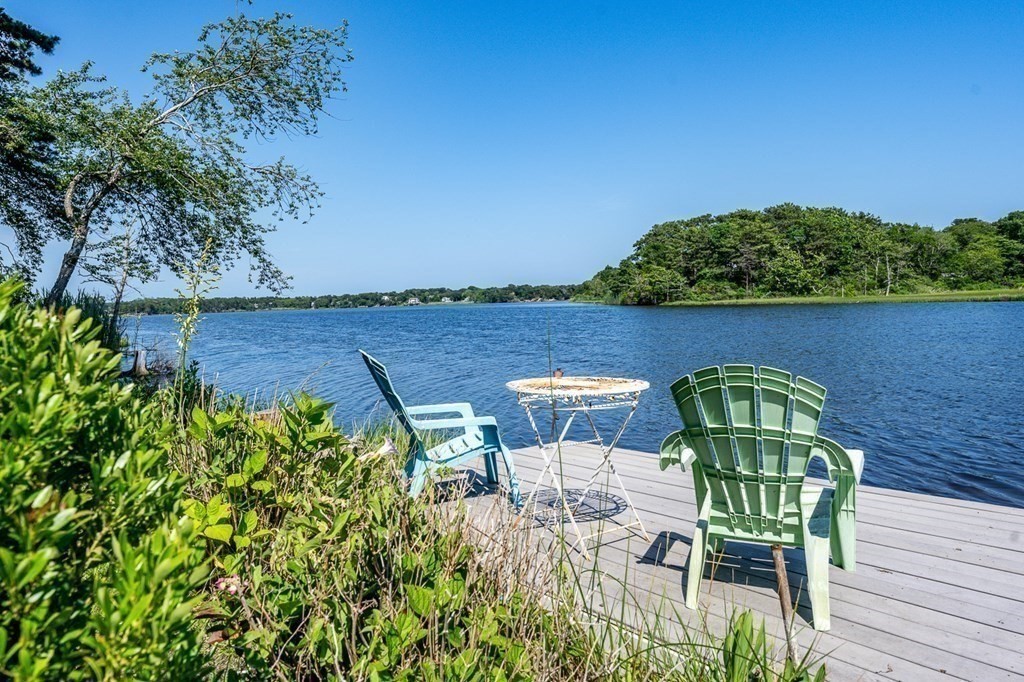 41 Aunt Debby's Road Dennis Port, MA 02639 - Photo 6 of 42 a view of a chairs and table in the patio